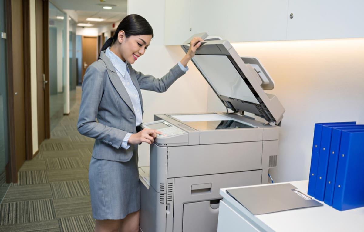 woman using office copier