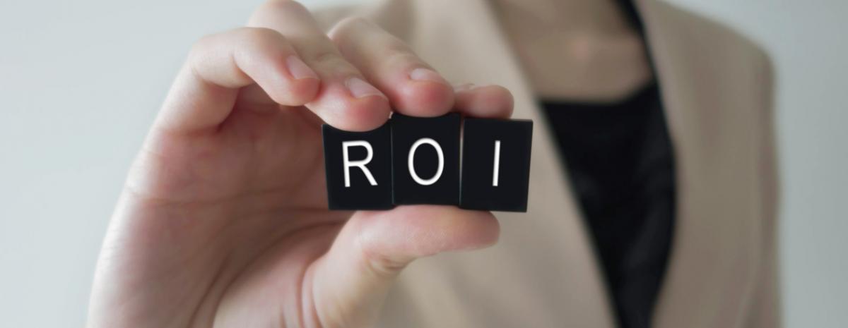 return on investment (ROI) spelled out with blocks