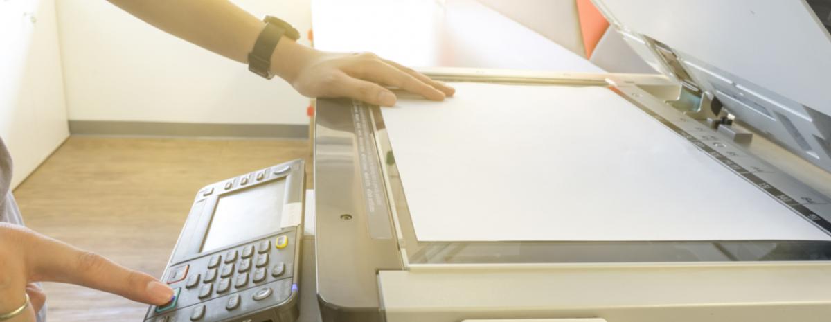 person scanning a document