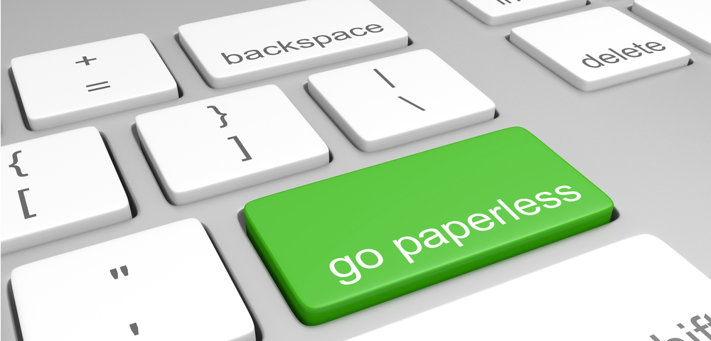 keyboard with large green button that reads: go paperless