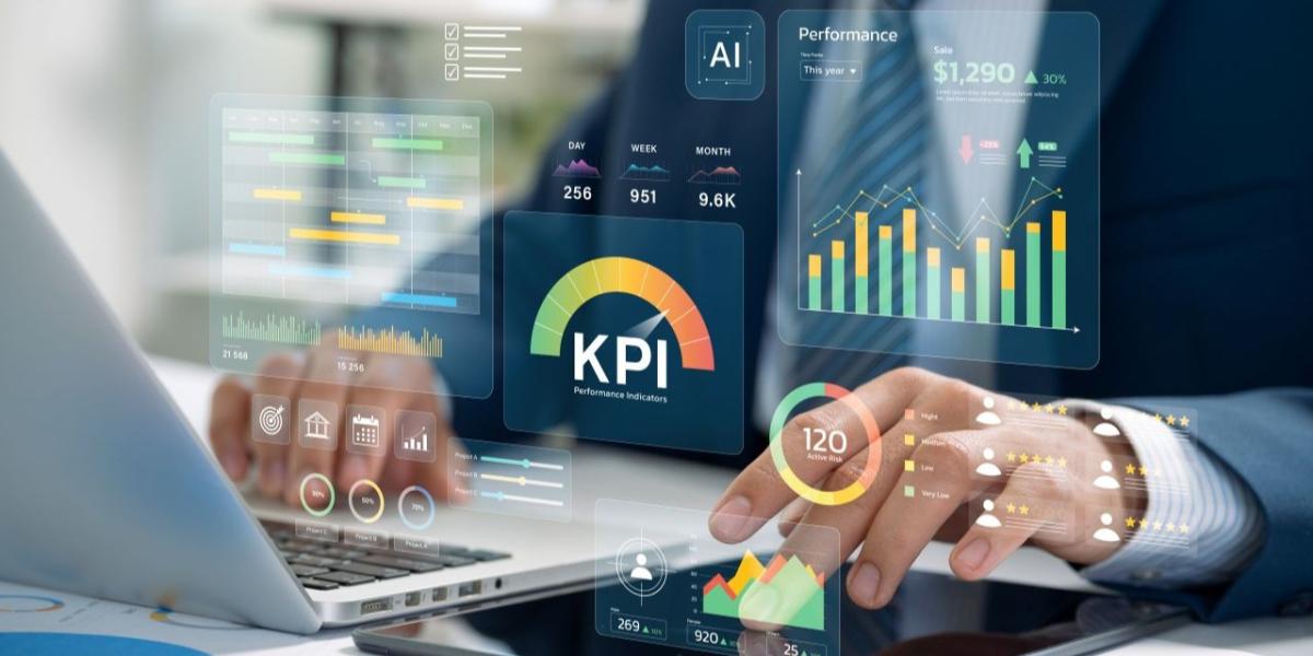 Executives reviewing operational performance data on a digital dashboard in an office setting