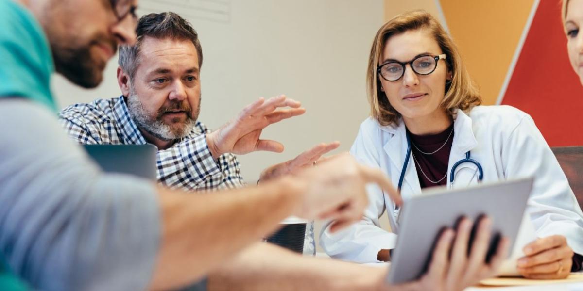 Healthcare professionals working within a secure medical office environment managing patient information