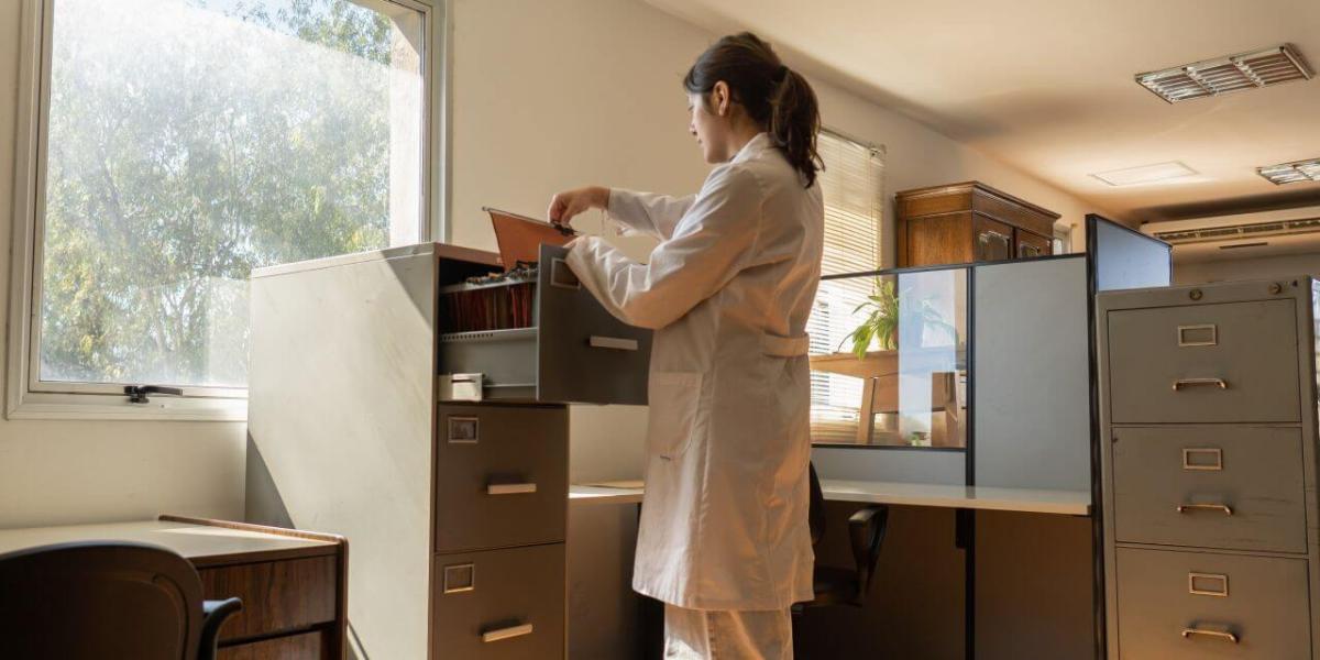 doctor going through documents
