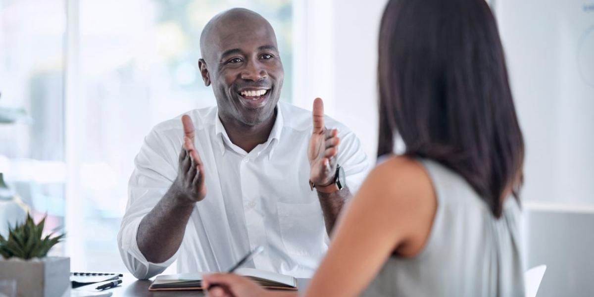 Office manager reviewing digital document workflow dashboard on computer
