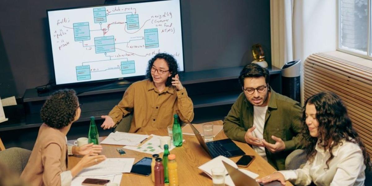 Operations team reviewing workflow dashboards and office technology tools